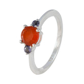 Kristine multicolor gemstone trilogy ring with a large orange center stone and two smaller purple gemstones